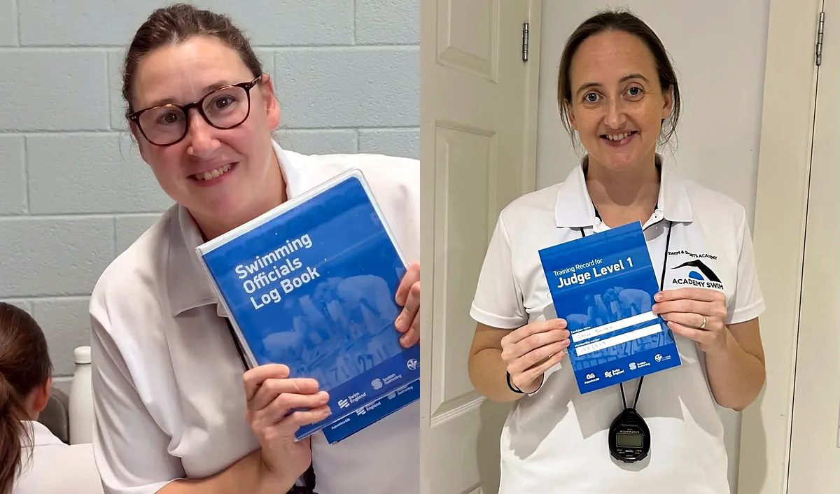 Two swimming officials in white club polo shirts, one holding a Swimming Officials Log Book and the other a Judge Level 1 training record